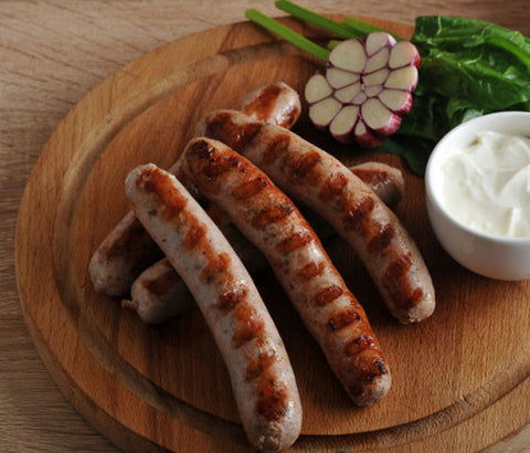 2 Saucisses de poulet braisées